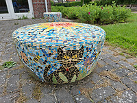 Kat op kruk
