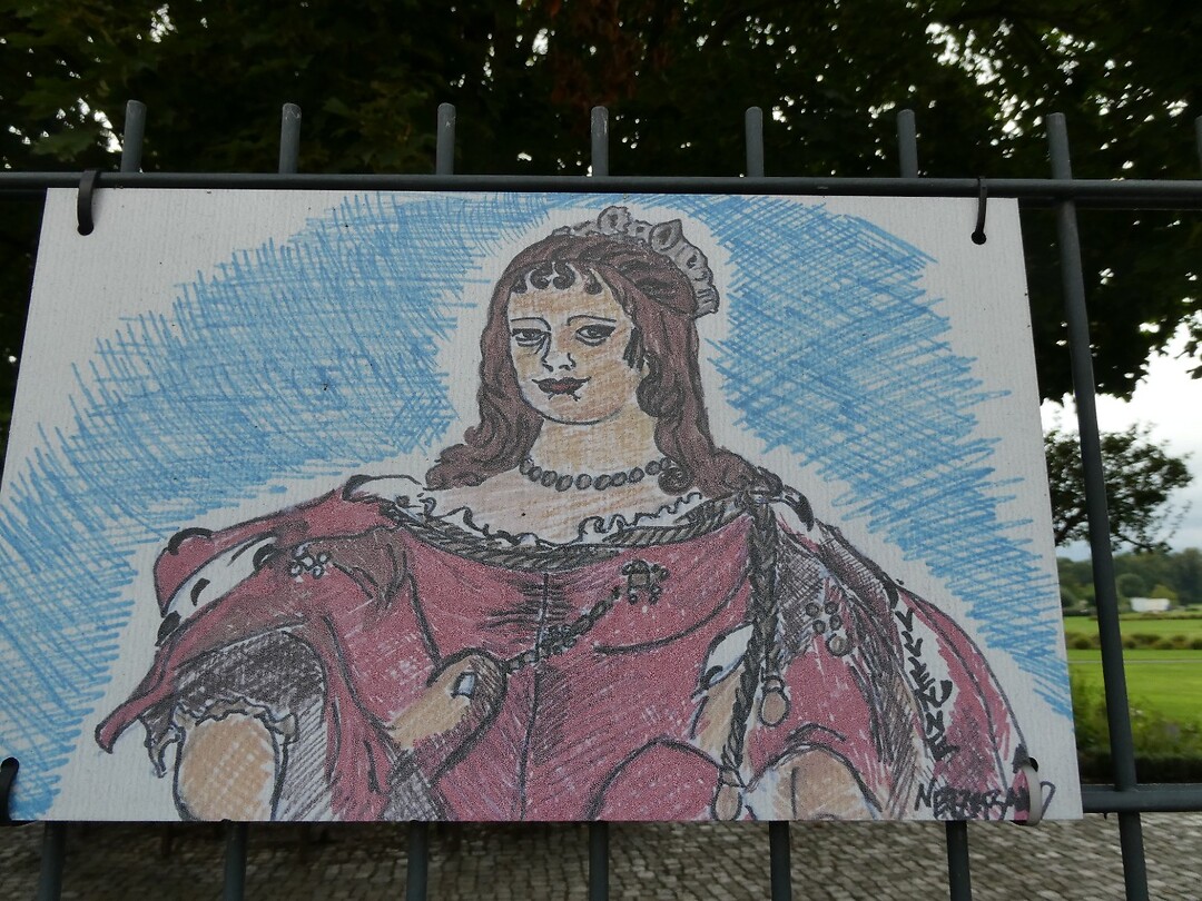 Tekeningen op het hek van het slotpark