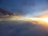 Zonsondergang vanuit het vliegtuig