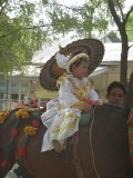 Parade of kids becoming a monk