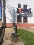 Maandag wasdag en fontein met schelp