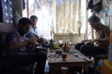 Wahid, zijn vader en Alireza.