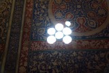 Een lichtstraal op een fresco.
