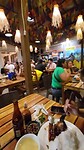 Dinnertime: one table, two restaurants and two bills
