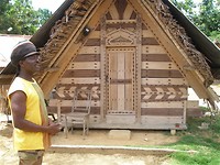 Rastafari voor een wosu cabin . Pikin Slee.