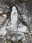 Beeld met weiwater schaaltje