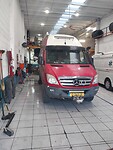 In de garage voor Olielek