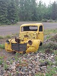 Oude auto's op de Alaska Highway