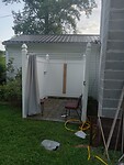 Buitendouche achter de pastoriewoning