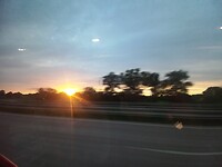 Zonsondergang in bus