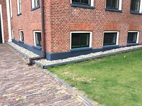 Rubberen ring onder huis.