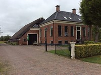 Gerestaureerde boerderij na aardbevingen