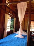 Bed in bungalow Chaung tha