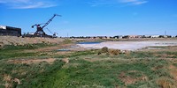 De drooggevallen haven van Aralsk