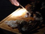 Men cutting the meat 2