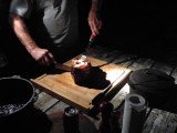 Men cutting the meat