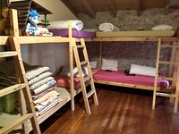 Stapelbedden in de fantastische, kleine herberg van Santa Cruz de Bezana