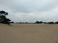 heel veel zand, ik moet er dwars door heen