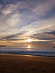 Warme avondgloed surfstrand