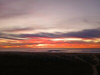 Zonsondergang surfstrand