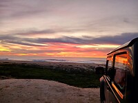 Jimny zonsondergang surfstrand