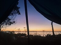 Zonsopgang door de tent