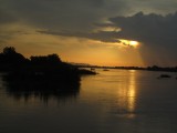Zonsondergang over de Mekong