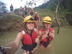 These spoiled backpackers don't like to swim in the cold water to enter the Dark cave!