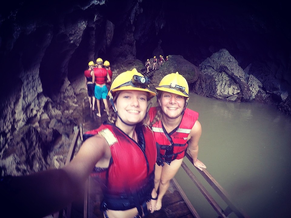 In front of the Dark Cave where we've had an amazing mudbath!
