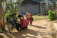 Curious kids watching while our chef was reparing the motorbike