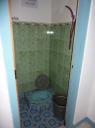 Onze riante badkamer in Ruteng