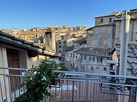 Uitzicht over Siena vanuit hotelkamer
