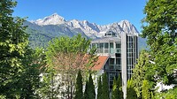 Uitzicht op Alpen vanuit hotelkamer in Garmisch