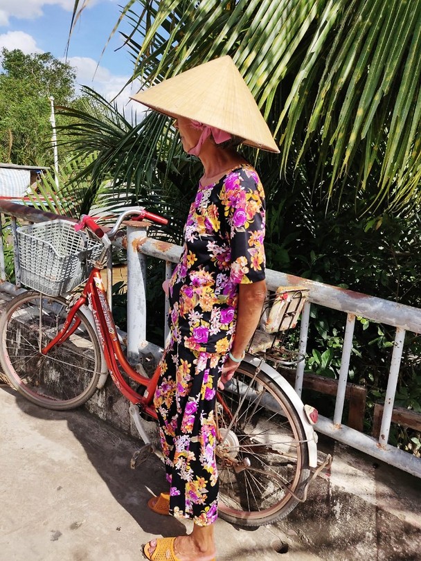 Vietnamese on a bike