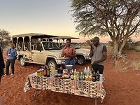 Een drankje bij de zonsondergang