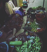 Nightmarket, the woman is tired