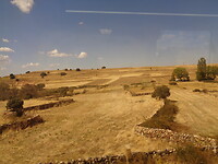 Het landschap vanuit de trein.