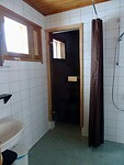 De badkamer met sauna in Holiday Village Valle