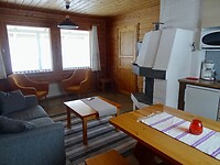 De woonkamer met zicht op de rivier in Holiday Village Valle