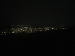 Nighttime view over the city, stays beautiful.