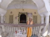 Temples, got a nice little dot on my face there. 10 INR, of course