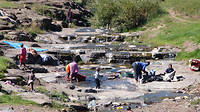 wassen in de rivier
