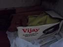 Vijay! in an iron box
