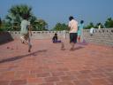 Vijay and the kids play on the roof