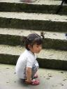 Mt Emei Shan - kneeling little girl
