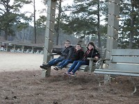 op de schommel