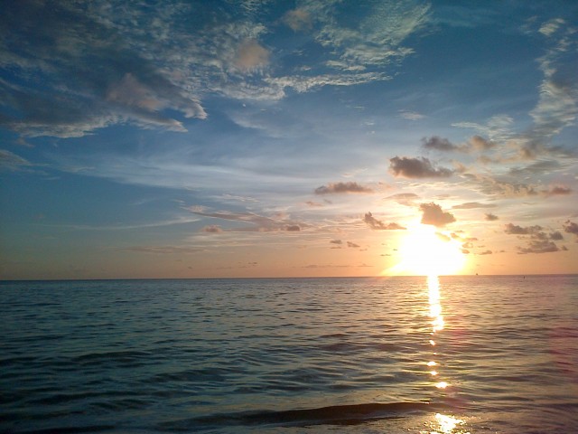 Zonsondergang aan het strand.