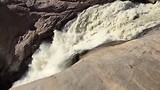 Augrabies Waterfall : een schuimende Orange river