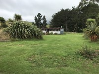 Tuin van Piketitiri Lodge Met de Cottage