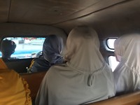 In de taxi